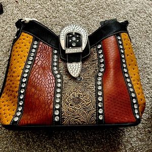 Selling “Rustic Couture” bag, with shoulder strap as well. Medium-Large Bag.